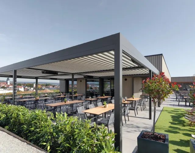 Perfect sun shading and weather protection concept with slat roofs