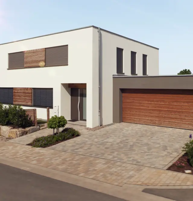 Inbyggda rulljalusier och utvändiga persienner på fönstren i en modern bostadsbyggnad med ett stort grått garage och en brun garageport